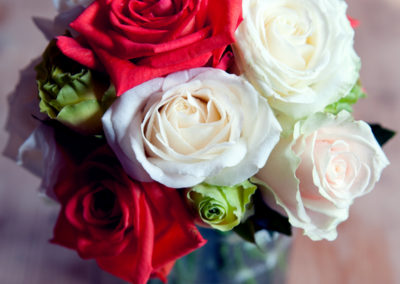 Red and white rose bespoke wedding flowers by Shrinking Violet